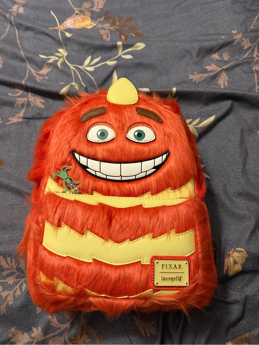 Loungefly Pixar Red Fuzzy Monster Backpack with Yellow Accents